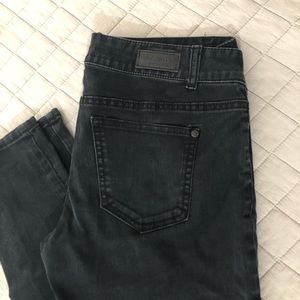 Faded black skinny jeans